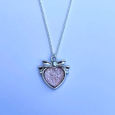 This pretty pink heart necklace is perfect for everyday or special occasions, would make a lovely bridesmaid gift, or birthday present for someone special. The pendant has a slight sparkle and is very pretty so would add a touch of coquette style to your everyday look. This comes on an 18 inch silver plated chain. Pink Silver Heart Necklace, Pink Sterling Silver Heart Necklace, Dainty Style, Necklaces Coquette, Couqette Necklace, Heart Coquette Necklace, Pink Heart Necklace, Quirky Jewelry, Coquette Style, Pretty Pendant