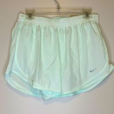 Nike Bottoms With Elastic Waistband And Short Leg, Nike Sporty Summer Pants, Nike Bottoms For Beach And Spring Season, Sports Pants With Built-in Shorts For Spring, Nike Summer Athleisure Pants, Nike Athleisure Pants For Summer, Nike Stretch Bottoms For Spring, Pink Nike Pros, Nike Pro Spandex