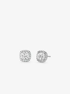 Perfect for daily wear these stud earrings channel a refined glamour. Crafted from sterling silver and available in two luxe platings this elegant pair features a cubic zirconia center that’s surrounded by pavé accents. Wear yours with everything from office-ready separates to evening ensembles. Michael Kors Earrings, Outfit Pieces, Thoughtful Gifts For Her, Woman Jewelry, Michael Kors Jewelry, Grad Pics, Friend Group, Cz Stud Earrings, Jewelry Lookbook