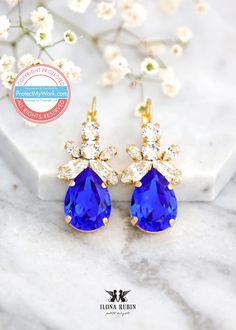 Royal Blue Earrings Blue Royal Crystal Earrings Bridal Royal - Etsy Blue Crystal Drop Earrings For Formal Occasions, Blue Drop Earrings For Bridal Formal Occasion, Blue Drop Earrings For Formal Bridal Wear, Blue Bridal Earrings For Formal Occasions, Blue Teardrop Bridal Earrings For Anniversary, Blue Drop Cluster Earrings For Gift, Blue Cluster Drop Earrings As Gift, Blue Teardrop Crystal Earrings For Wedding, Elegant Blue Bridal Earrings For Bridesmaids