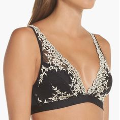 Wacoal's Soft And Sexy Signature Embrace Lace Wire Free Bra Is A Beautiful Choice For Women Who Want The Comfort Of A Soft Cup Bra That Is Still Supportive. An Added J-Hook Feature Enables The Bra To Easily Convert To A Racer-Back To Accommodate Even The Most Challenging Fashions. Straps Convert To T-Back With J-Hook. Wacoal Signature Embrace Lace Cups Have Two Sections For Added Support. Two-Ply Stretch Inner Cup. Camisole Straps Are Built Up For Added Support. Straps Are Fully Adjustable In Ba Black Bra With Contrast Lace For Party, Black Party Bra With Contrast Lace, Black Delicate Lace Bra For Evening, Black Full Cup Lace Bra, Black V-neck Bra, Black Delicate Lace Evening Bra, Black Full Coverage Micro-elastic Bra, Lace Sleepwear With Built-in Underwire Bra, Soft Cup Bra