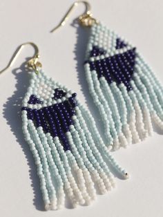 Classic beaded drape earrings with tones of ocean and sky 🌊 Fair trade Handcrafted in India Glass beads Hypoallergenic & nickel free Measures 2.75" in length Handmade Light Blue Jewelry For Summer, Unique Blue Jewelry For Summer, Unique Blue Summer Jewelry, Adjustable Beaded Blue Earrings, Adjustable Blue Beaded Earrings, Bohemian Blue Long Drop Beaded Earrings, Blue Large Beads Dangle Earrings, Blue Large Beaded Dangle Earrings, Blue Bohemian Beaded Earrings With Large Beads