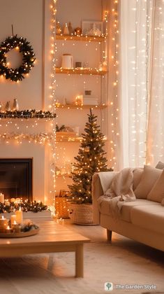 a living room decorated for christmas with lights and candles on the fireplace mantels