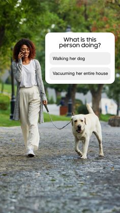 a woman is walking her dog while talking on the phone with an ad above her that says, what is this person doing?