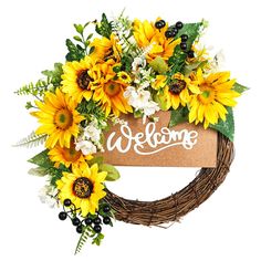 a welcome wreath with sunflowers and greenery