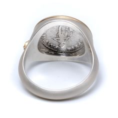 Item Description: Authentic Roman Coin encased in ring. Ring available in solid 18K gold or solid 925 silver with 18K gold bezel and logo. Each piece comes with a certificate of authenticity. Please note some sizes may require longer lead times due to inventory constraints. Authentic Coin Details: Coin Type & Age: Silver Denarius, 161-180 ADEmperor: Marcus AureliusDiameter/Weight: 17.5 - 18.5 mm / 3 - 3.8 gFront/Back: Portrait of Emperor / Mythological & Military Themes The Stoic philosopher-kin Luxury Formal Signet Ring With Intaglio, Luxury Intaglio Rings For Anniversary, Classic Sterling Silver Intaglio Ring, Timeless Silver Engraved Ring Stamped 14k, Collectible Luxury Gold Rings, Classic Yellow Gold Signet Ring With Intaglio, Luxury 14k Gold Signet Ring With Intaglio, Luxury Round Signet Ring With Intaglio, Timeless Round Intaglio Rings