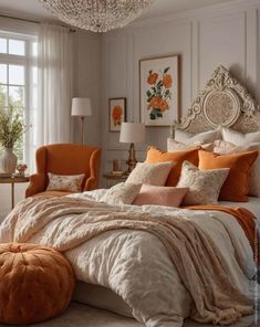 an orange and white bedroom with chandelier