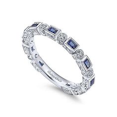 Luxury Diamond Ring With Sapphire And Baguette Cut, Elegant Luxury Sapphire Ring With Baguette Diamonds, Luxury Classic Sapphire Ring With Baguette Diamonds, Luxury Sapphire Stackable Rings With Round Band, Luxury Sapphire Stackable Engagement Rings, Luxury Stackable Cubic Zirconia Sapphire Ring, Luxury Blue Sapphire Stackable Rings, Luxury Elegant Sapphire Stackable Rings, Luxury Sapphire Stackable Rings