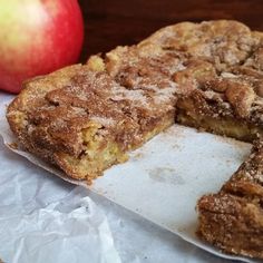 an apple pie is cut in half and ready to be eaten