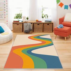 a colorful rug in a child's room with chairs and toys on the floor