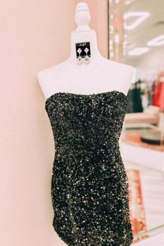 black sequined mini dress Black Sequin Dress For Homecoming And Prom, Black Sequin Dress For Homecoming And Prom Season, Black Strapless Sequin Dress For Prom, Strapless Sequin Dress For Homecoming And Prom, Strapless Sequin Dress For Prom And Homecoming, Strapless Sequin Dress With Fitted Bodice For Night Out, Sequin Strapless Dress For Prom Night Out, Strapless Sequin Mini Dress For Homecoming, Strapless Sequin Dress For Night Out During Prom Season