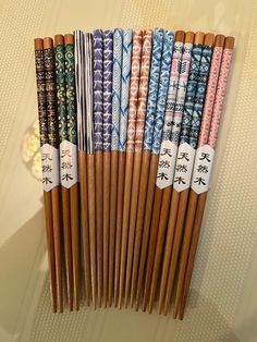 This listing is for 1 pair of japanese chopsticks.  there are 10 different variation designs to choose from .  they are new and approx 9 inches long, and made of wood.  i will put them in a free handmade silk holder.  the holder is 7 inches long so the design on the chopstick will show. Japanese Chopsticks Aesthetic, Cool Chopsticks, Chopsticks Aesthetic, Handmade Chopsticks, Temple Flower, Chopsticks Design, Japanese Chopsticks, Dining Ware, Zero Waste Gifts