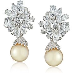 Immerse yourself in the breathtaking beauty and timeless elegance of our Platinum 26-carat Diamond Cluster and Pearl Drop Earrings. Every aspect of this masterpiece is crafted with the utmost care and precision, showcasing the perfect fusion of luxurious elements.Picture yourself adorned with these exquisite earrings, featuring two meticulously matched creamy South Sea pearls, each measuring a radiant 0.5 inches. The pearlescent allure is further enhanced by a resplendent cluster of brilliant-cu Yellow Jewelry, Diamond Birthstone, Drop Design, Pearl Design, Sea Pearl, Platinum Metal, Marquise Diamond, Women Diamond, Diamond Drops