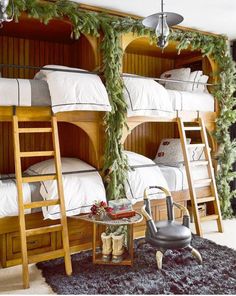 bunk beds in a room with black rugs