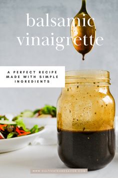 balsamic vinaigrette in a jar with a spoon sticking out of it