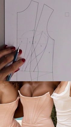 two women in dresses are drawing on paper