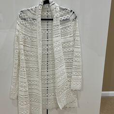 Pretty Crochet Cardigan, Perfect Condition Never Worn. Perfect Top To Throw Over A Camisole & Jeans! Elegant Crochet Top For Spring Layering, Elegant Spring Crochet Top For Layering, Elegant Open Knit Crochet Top For Spring, White Cardigan With Crochet Trim For Fall, Elegant Crochet Top For Layering, White Crochet Outerwear For Summer, White Lace Cardigan For Spring, Elegant Long Sleeve Crochet Top For Beach, White Crochet Sweater For Layering