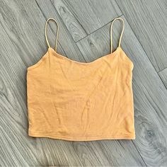 Pacsun Cropped Tank Top With Skinny Straps. The Fabric Is Very Soft, Never Been Worn Only Washed. New Without Tags! Orange Summer Tank Top For Day Out, Orange Cotton Crop Top For Summer, Yellow Spaghetti Strap Tank Top For Vacation, Mustard Casual Crop Top For Summer, Yellow Cami Tank Top For Day Out, Orange Tank Top For Summer Day Out, Mustard Sleeveless Tank Top For Summer, Orange Tank Top For Day Out In Summer, Yellow Spaghetti Strap Tank Top For Summer