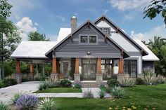 this is an artist's rendering of a house in the country style with front porch and covered entry