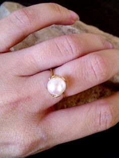 This ring features a delicate White Pearl gemstone set in 14k gold filled ring. => Gemstone Type -Natural Pearl => Gemstone Size - 8mm => Metal Type - 14k Gold Filled (Tarnish Resistant And Nickel Free) ♦ Replace the gemstone with many other gemstones we have in stock My another shops on Etsy http://www.CandySimpleJewelry.etsy.com http://www.CandyCrystalsJewelry.etsy.com Important information **My customer service is available 7 days a week ** All jewelry items will come to you nicely p 14k Gold Filled Open Rings For Wedding, Elegant 14k Gold Stackable Pearl Ring, Fine Jewelry Stackable Round Pearl Ring, Fine Jewelry Stackable Pearl Ring, Stackable Round Pearl Ring In Fine Jewelry Style, 14k Gold Filled Wedding Ring, Elegant 14k Gold Filled Promise Ring, Classic 14k Gold Filled Wedding Rings, Elegant Stackable Pearl Ring For Promise