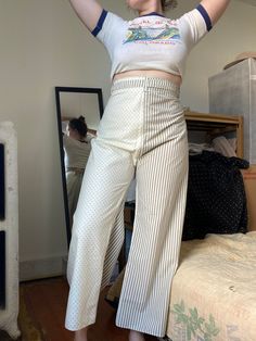 Unique & one of a kind pants. Only worn a few times. Can be worn fastened in front or back.  Waist: 16 Rise: 16 Hip: flexible depending on desired fit (shown on 42" hip) Inseam:25.5 White Full-length Bottoms With Belt Loops, Fitted Cotton Trousers, White Full Length Pants With Belt Loops, White Fitted Straight Leg Bottoms, Fitted White Straight Leg Bottoms, Vintage Stretch Cotton Bottoms, Vintage Stretch Wide Leg Pants, Vintage Wide Leg Stretch Pants, Fitted Summer Pants With Belt Loops