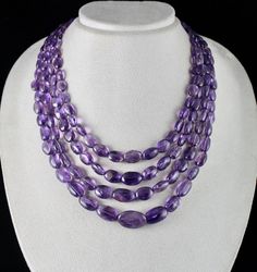 PRODUCT DETAILS LINE 4 /CTS 662 NATURAL AMETHYST LONG TUMBLE BEADS ULTIMATE RARE SIZE NATURAL BEADS SIZES OF THE BEADS ARE FROM 22 MM TO 6 MM LENGTH OF THE NECKLACE IS 15 INCHES OUTER LENGTH OF THE NECKLACE IS 19 INCHES GRAB IT NOW!! FINE PURPLE COLOR BEST LOWEST PRICE OFFERED NOTE - #You will receive the same product you see in picture. #DEAR BUYERS PLEASE FEEL FREE TO ASK QUESTIONS #WE WILL BE GLAD TO ANSWER & SOLVE QUERY REGARDING THIS PRODUCTS #RETURN POLICY Every piece of jewellery and inpu Luxury Amethyst Gemstone Beads, Purple Beads Necklace, Amethyst Jewellery, Violet Necklace, Beaded Fashion, Beads Chain, Amethyst Jewelry, Amethyst Beads, Amethyst Necklace