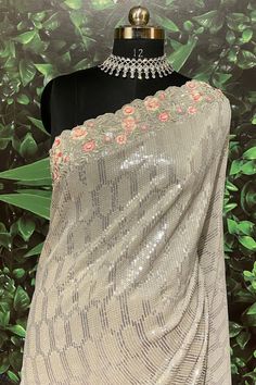 This Saree is Ready to Wear Add a touch of elegance to your party attire with this Gray Georgette Saree. Featuring stunning floral sequins, this saree is sure to make a statement. Its lightweight and flowing fabric make it comfortable to wear, perfect for any occasion. Upgrade your wardrobe today with this elegant saree. (With Fall and Pico Done) Fabric Details Blouse: GeorgetteSaree: GeorgetteBlouse Piece Length: 85cm meterSaree Length: 5.7 meter Kurta Pajama Men, Sequence Blouse, Indo Western Gown, Saree Petticoat, Full Sleeve Blouse, Flowing Fabric, Lehenga Skirt, Party Attire, Ready To Wear Saree