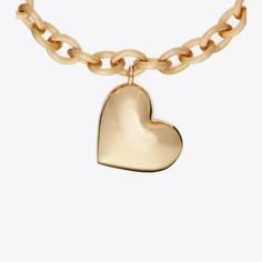 In polished 18K-gold-plated brass, our Necklace comes with a removable heart charm. Wear it on its own, layered with other styles or customized with any of our charms. Designer Jewelry, Necklace Designs, Heart Charm, Heart Necklace, Designer Shoes, Designing Women, Tory Burch, 18k Gold, Jewelry Design