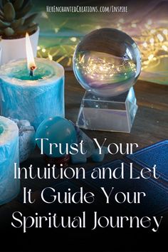 three candles with the words trust your intention and let it guide your spiritual journey