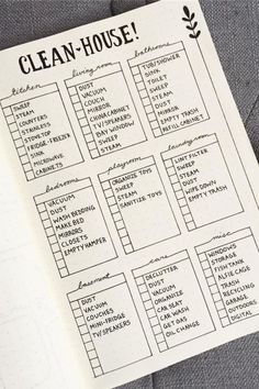 a clean house checklist on top of a notebook