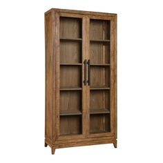 a wooden bookcase with glass doors on the front