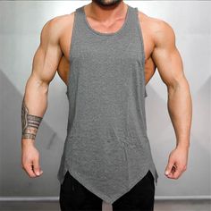 Sleeveless Muscle Tee For Gym In Summer, Sleeveless Muscle Tee For Summer Sports, Gray Workout Tank Top For Summer, Summer Gym Racerback Vest, Gray Tank Top For Summer Workout, Summer Racerback Gym Vest, Gray Muscle Tee For Summer Workout, Gray Tank Top For Summer Sports, Gray Tank Top For Sports In Summer