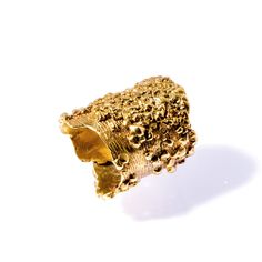 Hand cast brass crystalized bark ring. Band width spans from 3/4" to 1". 2mm thick. Handmade in the USA.