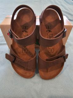 Vintage Birkenstock Womens Sandal "Montego" in Birkibuc Mocha brown. The leather has a beautiful pattern. Size US-7/EU38/UK5.  Like NEW, in original box! Please be sure of size before ordering (See attached size chart). Brown Sandals With Leather Footbed And Round Toe, Brown Leather Footbed Sandals With Round Toe, Brown Sandals With Adjustable Ankle Strap, Brown Round Toe Sandals With Leather Footbed, Brown Sandals With Cushioned Footbed And Round Toe, Brown Ankle Strap Sandals With Adjustable Strap, Brown Double Strap Sandals With Leather Footbed, Brown Sandals With Adjustable Strap, Brown Leather Sandals With Adjustable Strap