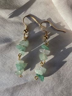 ✨green stone dangly earrings!! $10 a pair!✨ Green Jade Earrings With Natural Stones, Green Aventurine Drop Earrings, Green Gemstone Drop Crystal Earrings, Green Wire Wrapped Crystal Earrings As Gift, Green Aventurine Dangle Earrings, Green Wire Wrapped Crystal Earrings For Gift, Handmade Green Crystal Drop Earrings, Trendy Green Crystal Earrings For Gift, Green Dangle Crystal Earrings For Gift