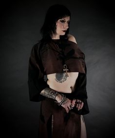 This cropped shrug offers an optimal accompaniment to your cooler-weather wardrobe. Layer it over a dress or another shirt, or simply don it on its own for a more seductive, midriff-baring aesthetic. The exquisite silhouette of the triple crow print is crafted with a dye-removing technique, allowing each piece to showcase unique color variations, splatter patterns, and more. This shirt is free size. My turnaround time is 1-2 weeks. If you need an item by a certain time please feel free to contact me prior to purchase and I will let you know if that date is possible. Photos by Travis Williams, modeled by Melaney Gothic Long Sleeve Crop Top For Fall, Fall Crop Top For Alternative Fashion, Crow Print, Cropped Shrug, Cooler Weather, Unique Colors, Womens Clothing Tops, Free Size, Color Variations