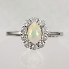 Solid 925 Sterling Silver And Natural 6x4mm Opal. 0.25ct Simulated Diamonds. Ring Is Delicate, Images Are Zoomed In. Comes With Certificate Of Authenticity. Black Zirconium Ring, Luxury Wedding Rings, Big Stone Ring, Natural Opal Ring, Precious Stones Rings, Gem Diamonds, Vintage Style Rings, Diamonds Ring, Classic Engagement Rings