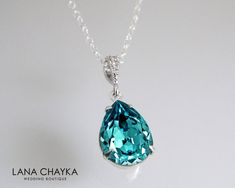 Swarovski Light Turquoise Teal Teardrop Crystal Rhinestone 925 Sterling Silver Chain Bridal Bridesmaid Wedding Necklace. Classy and elegant, this necklace would be perfect for any wedding or occasion! CHAIN is 18 inches (45.7 cm) long, PENDANT is about 1 inch (2.5 cm) long including bail. MATCHING EARRINGS: https://www.etsy.com/listing/124449021/wedding-bridesmaids-gift-earrings?ref=shop_home_active This necklace is made with 925 Sterling Silver 18 inches chain, Swarovski 14x10mm Light Turquoise Blue Teardrop Necklace For Wedding, Green Teardrop Bridal Necklace For Wedding, Green Teardrop Pendant Necklace For Wedding, Elegant Turquoise Bridal Necklace For Wedding, Turquoise Teardrop Wedding Jewelry, Crown Simple, Wedding Teal, Teal Jewelry, Teal Necklace