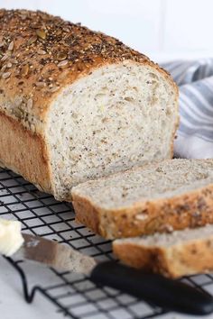 a loaf of bread sitting on top of a cooling rack