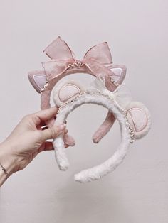 Bear/Cat Ears Headband 🌸Only two items available at this time, please send a message for the bear or cat ears. 🌸Handmade fuzzy headband. 🌸One size fits all. 🌸Materials may include silicon, acrylic, polyester, fluff, plastic accessories. 🌸Please understand that due to lighting and changes in color due to different screens can affect the appearance of some colors. 🌸Please note that each headband is unique and may be slightly different due to the availability of certain items. Thank you for your understanding. 🌸Please understand I am not responsible for broken or damaged products once they are in your care. Please do not hesitate to reach out should you have any issues when you receive your order. Cute Ears Headband Gift, Pink Ears Headband Gift, Pink Ears Headband As Gift, Pink Headband With Ears For Gift, Party White Ears Headband, Cute Adjustable Bunny Ears Headband, Cute White Hair Accessories With Ears, Cute Adjustable Bunny Ears Hair Accessories, Whimsical Adjustable Cat Ears Headband