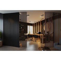 an office with black walls and wooden slats