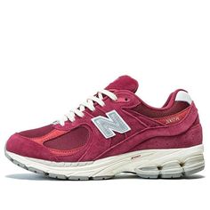 Introducing the New Balance 2002R 'Red Wine'! This luxurious sneaker is part of our brand new 'Suede Pack'. The rich garnet hue on the upper is absolutely stunning and looks even better in person. The airy mesh and soft suede materials used are of the highest quality and will feel great on your feet whether you're running errands or hitting the gym. The NB branding on the tongue and heel add a nice touch of detail, while the metallic silver ‘N’ logo really pops on the quarter panel. You'll love the way this shoe looks and feels! (SNKR/Retro/Light/Unisex/Low Top) Red New Balance, New Balance 2002r, N Logo, Marathon Running Shoes, Nike Dunk High, Rachel Green, Air Jordan 3, Marathon Running, Jordan 5