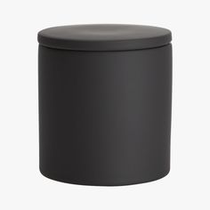 a black round container with a lid on the top and bottom, sitting in front of a white background