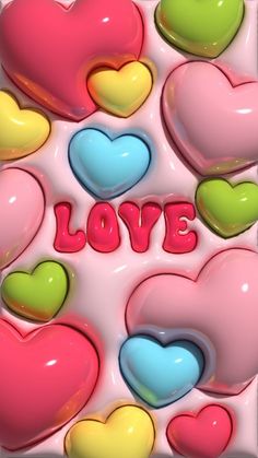 colorful hearts with the word love written on them