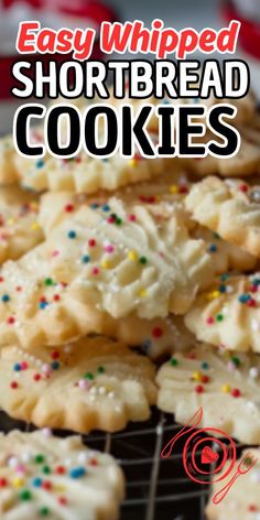 easy whipped shortbread cookies with sprinkles on a cooling rack