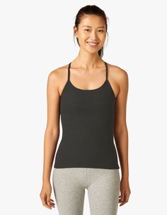 For essential style you can wear in and out of the studio, add the Slim Racerback Cami from Beyond Yoga to your workout wardrobe. Featuring a chic Darkest Night Spacedye hue, with a halter style neckline, and a keyhole design in back, this wardrobe essential is anything but basic! Made of a soft performance fabric with moisture wicking, 4-way stretch, and a built-in shelf bra, this tank will keep you comfortable throughout your workouts. Wear this tank for yoga, barre, dance, and everyday style! Darkest Night, Black Camis, Beyond Yoga, Halter Style, Mix N Match, British Indian, Mix And Match, Crop Tank, Bra Tops