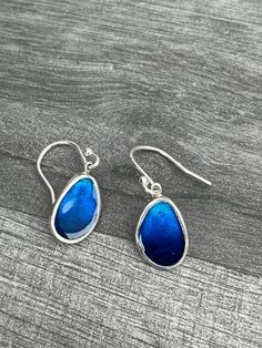 These blue pebble earrings are made from Sterling Silver and Enamel. I have used beautiful blue enamels which are encased in s Fine Silver border. They hang on Sterling silver hooks. They measure without the hook approximately 1.4cm in length.  Matching pendants and rings also available and if you would prefer short standard hooks, please let me know. Pebble Earrings, Blue Enamel Earrings, Matching Pendants, Enamel Jewellery, Blue Drop Earrings, Enamels, Enamel Earrings, Earrings Blue, Enamel Jewelry