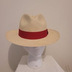 Cream With Red Band Panama Classic Flexfit And Timeless Design Embodies Generations Of Tradition And Authenticity. It Is The Perfect Finishing Touch To Any Look While Providing Protection From The Sun. Handwoven By Expert Artisans With Everlasting Toquilla Straw. Brim Size - 2-3/8” (6cm). Crown Size - 4-3/8” (11cm). Dimension - 13" X 12.5" X 4.5". Lined Internally With 100% Cotton. Features A Fine Polyester And Cotton Headband. Made In Ecuador Elegant Cream Panama Hat, Cream Lightweight Panama Hat, Classic Cream Wide Brim Panama Hat, Dread Women, Western Cream Brimmed Panama Hat, Cream-colored Curved Brim Panama Hat, Female Dreads, Flex Fit Hats, Cotton Headband