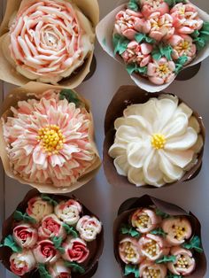 there are many cupcakes with flowers in them