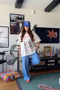 Loveee a fun blue & orange moment 🧡  What I wore to work from a coffee shop today!  Graphic tee is sold out - linking in case it comes back! Hat is Midnight Lunch 💙  Follow my shop @elizabethannblog on the @shop.LTK app to shop this post and get my exclusive app-only content!  #liketkit #LTKStyleTip #LTKSeasonal #LTKShoeCrush @shop.ltk Cool Graphic Tee Outfit, Summer Coffee Shop Outfit, Tshirt Work Outfit, Styling Graphic Tees Outfits, How To Style A Graphic Tee, Orange Blue Outfit, Fun Work Outfits, Oversized Graphic Tee Outfits, Blue Tee Outfit